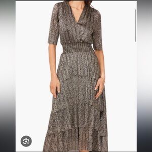 Vince Camuto worn once size medium. Formal long/midi dress.